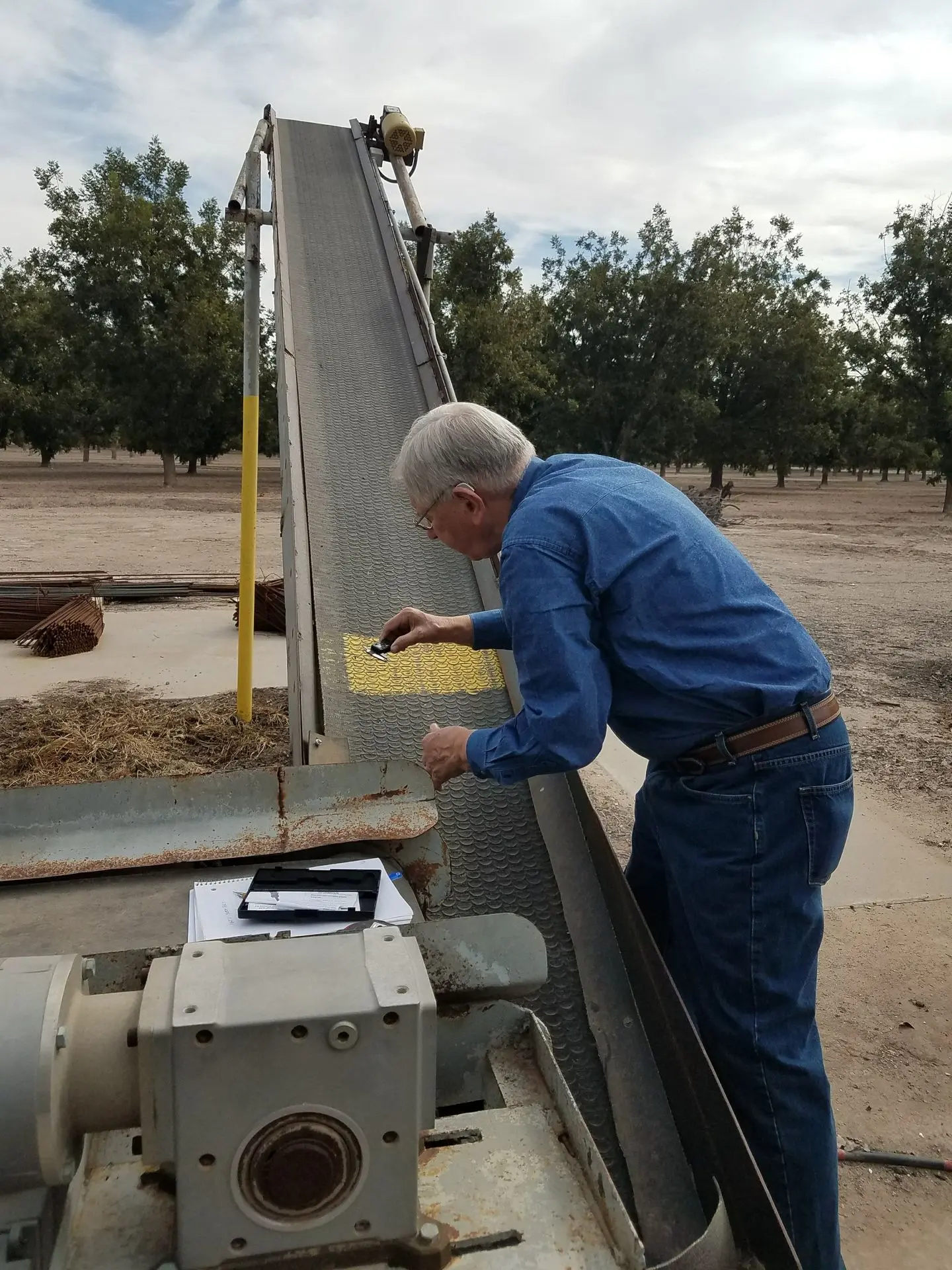 Roger Brown, Jr. and team sizing specialized power transmission conveyor belting for a pecan farm in the El Paso area to minimize dropped nuts